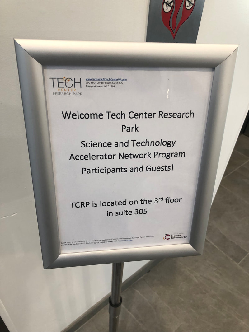 Welcome sign directing science and technology accelerator participants to the third floor