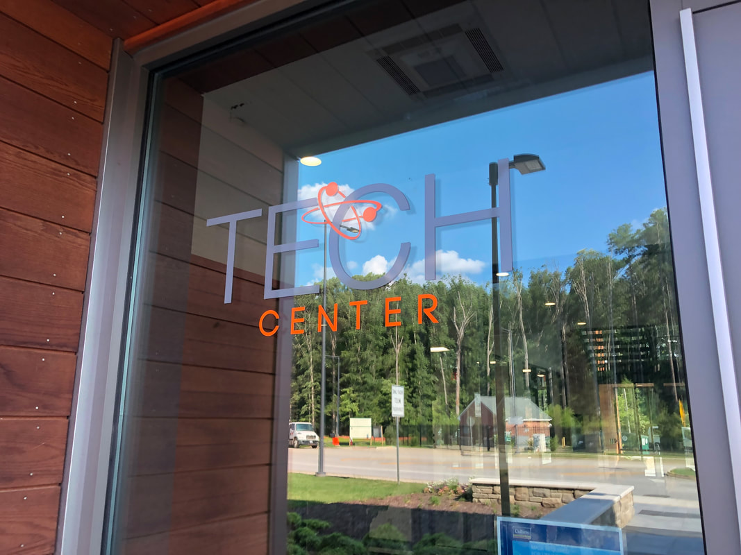 Tech Center lettering on the glass entrance door